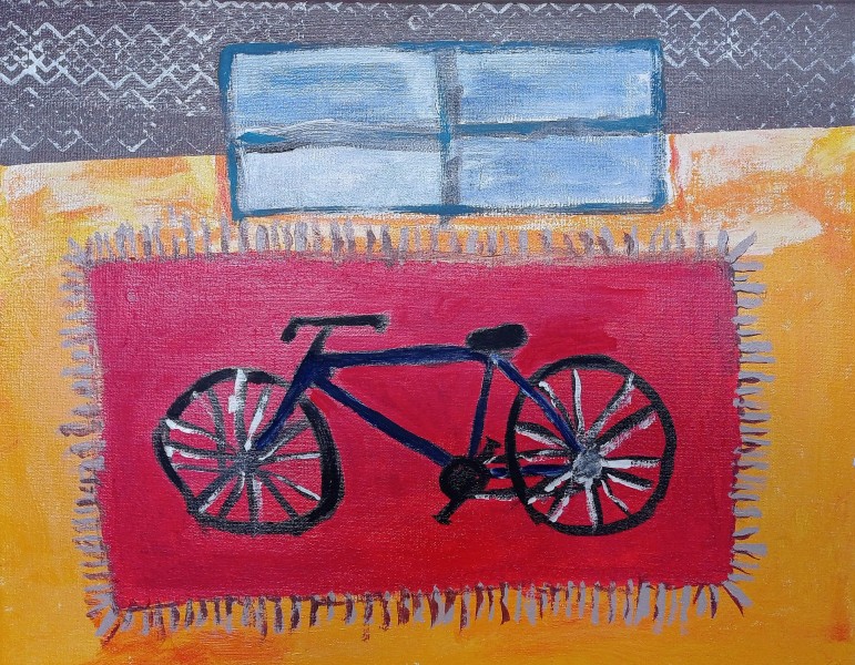 na ilustracji praca prezentujca rower na czerwonym tle